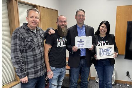 The team with Attorney General of Montana Austin Knudsen at the YMCA presentation.